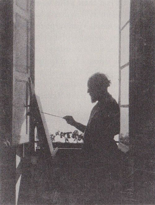 Matisse painting at his third floor studio window, Place Charles Felix
