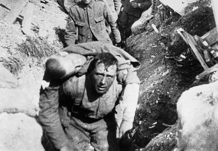 Frame from sequence 34 British Tommies rescuing a comrade under shell fire